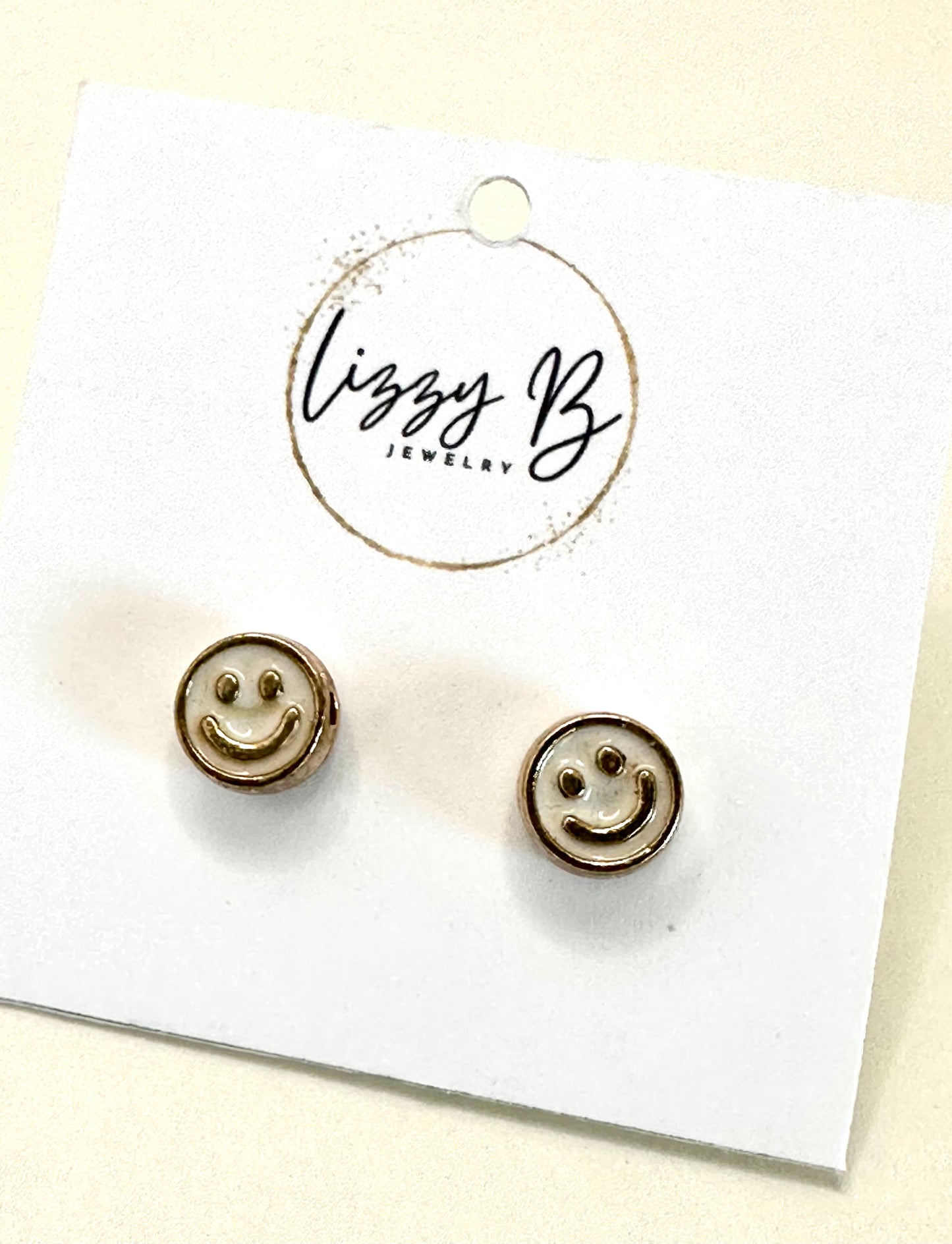 Cream Colored Smiley Face Earrings
