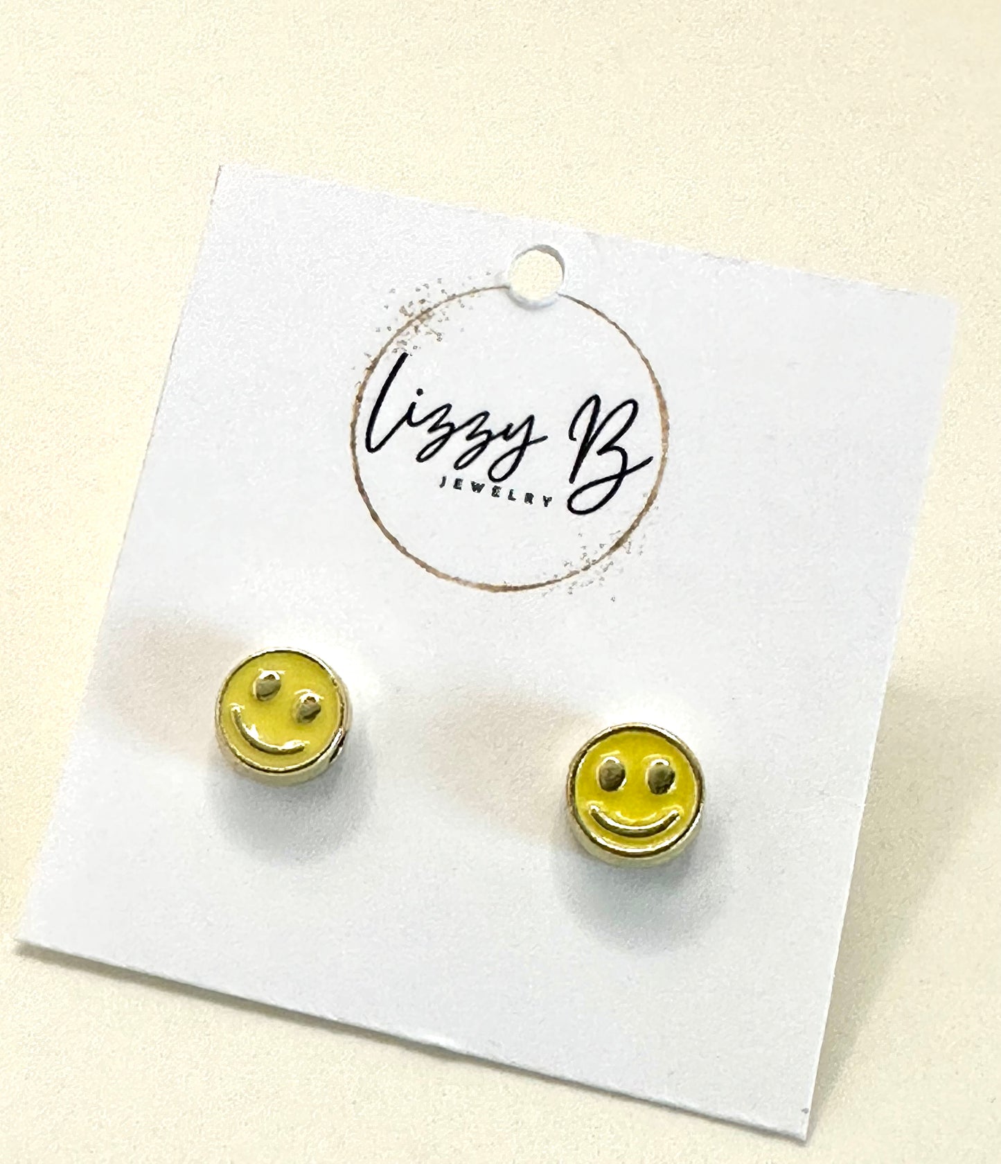 Yellow smiley face earrings
