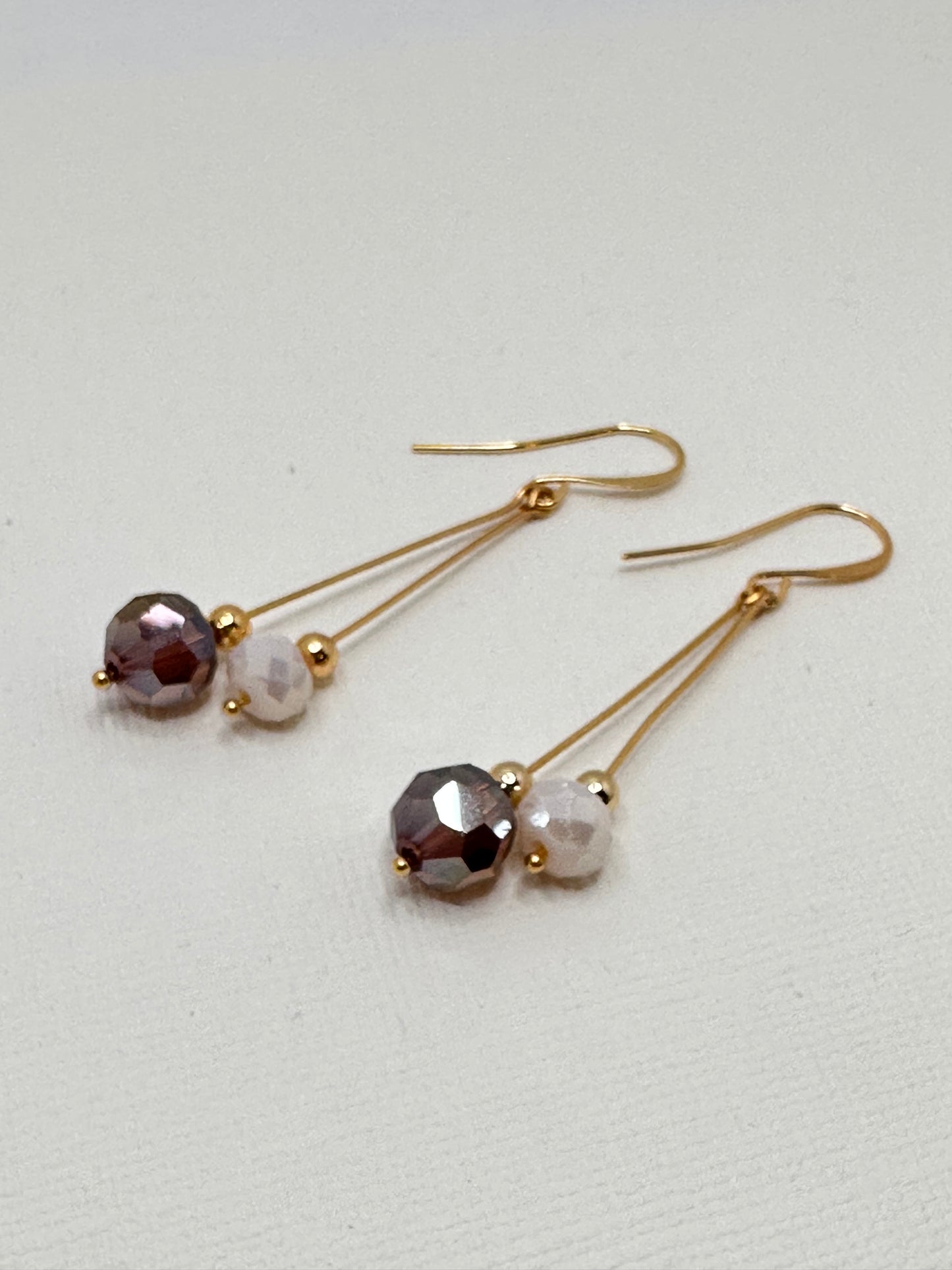 Gold dangling earrings